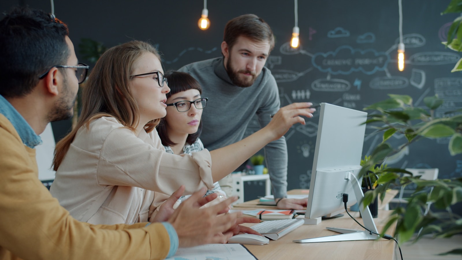 Agency team reviewing strategy and results on screen